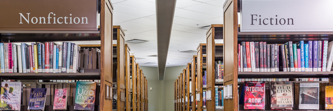 Fiction and Nonfiction aisles in the library