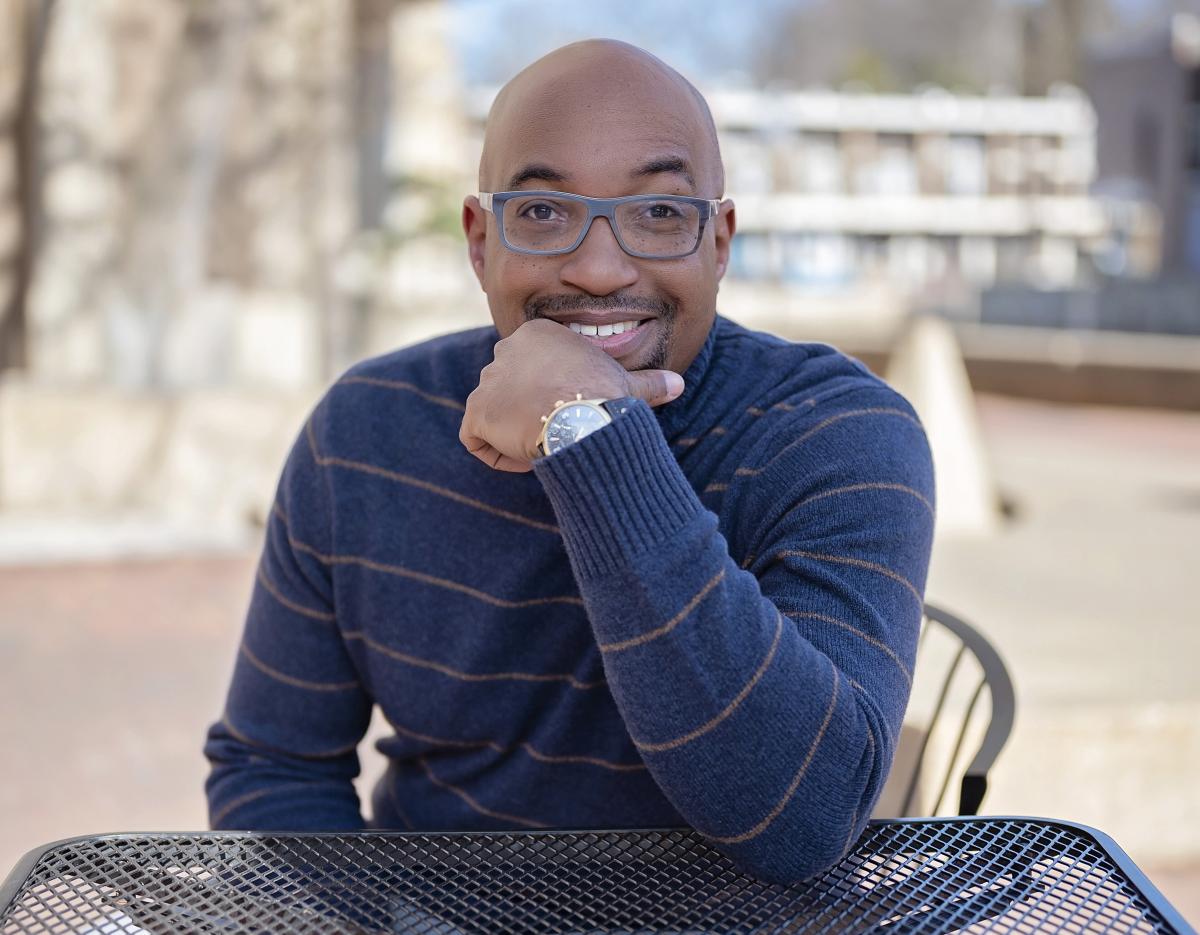 Kwame Alexander sitting